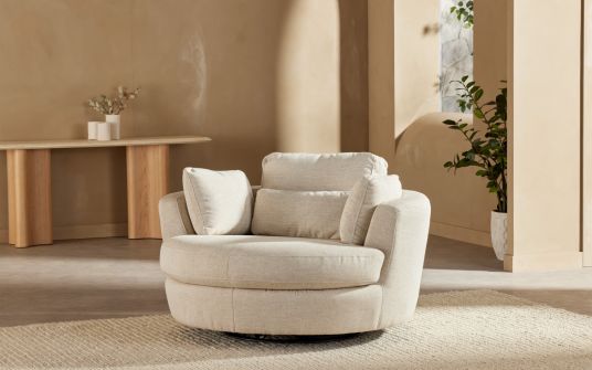 Sadie fabric swivel armchair